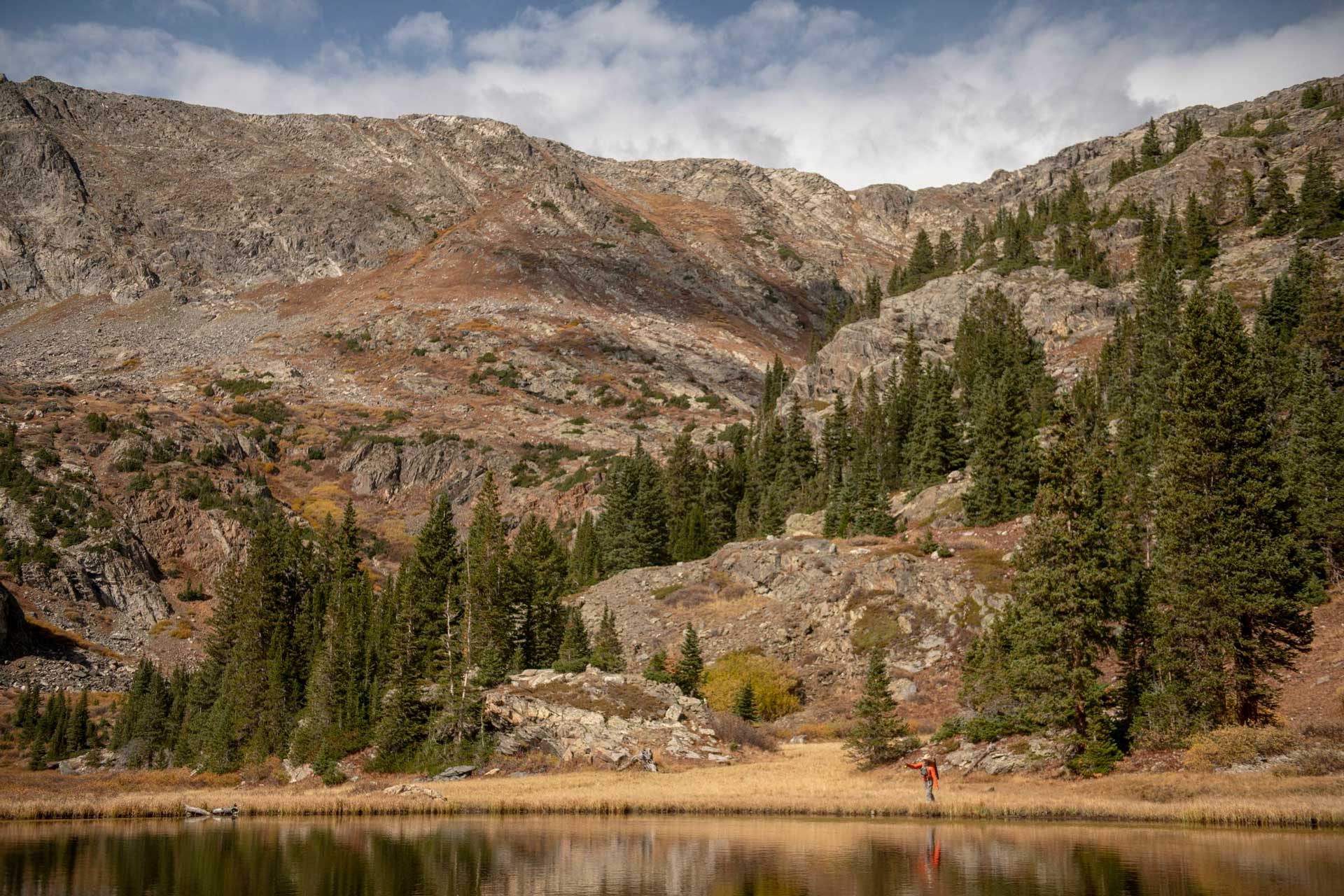 An angler fishing deep in the backcountry.